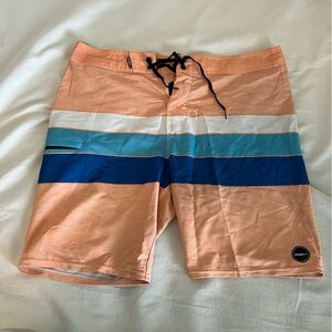 O'Neill Board Shorts in Orange and Blue with Modern Color-Block Design